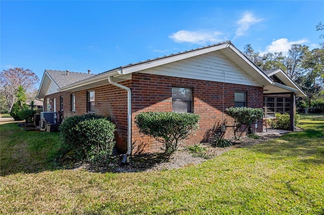 view of property exterior with a yard