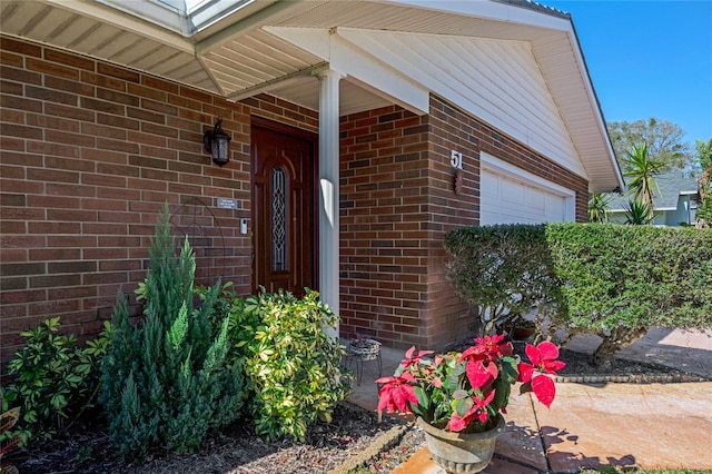 entrance to property featuring a garage