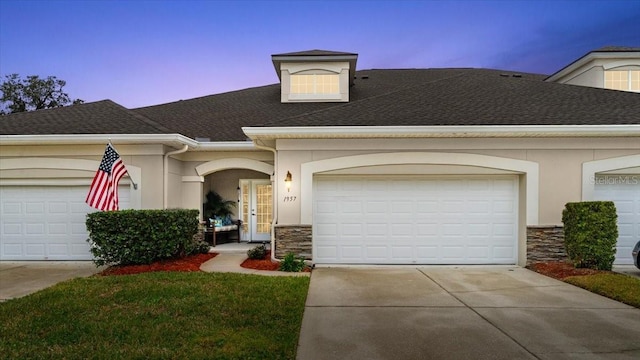 view of front of property featuring a garage