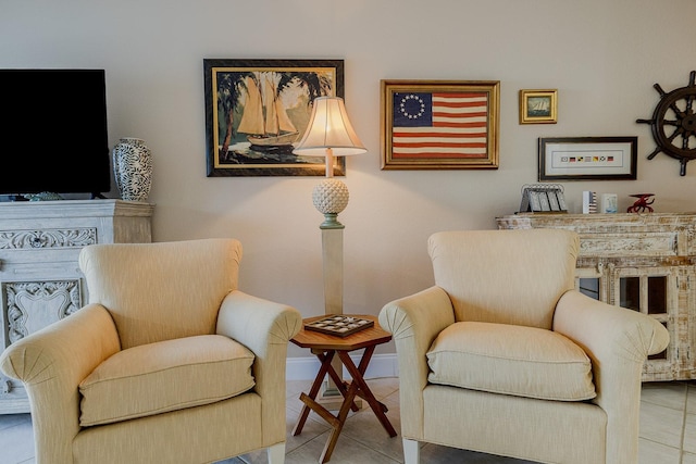 sitting room with light tile patterned floors