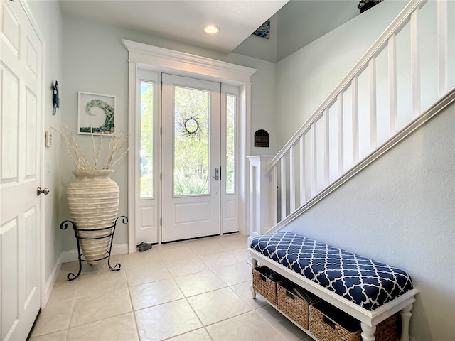 foyer entrance featuring light tile patterned floors