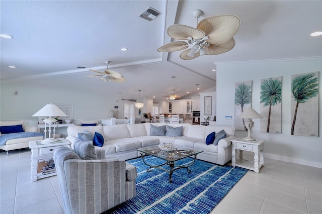 tiled living room with ceiling fan and vaulted ceiling