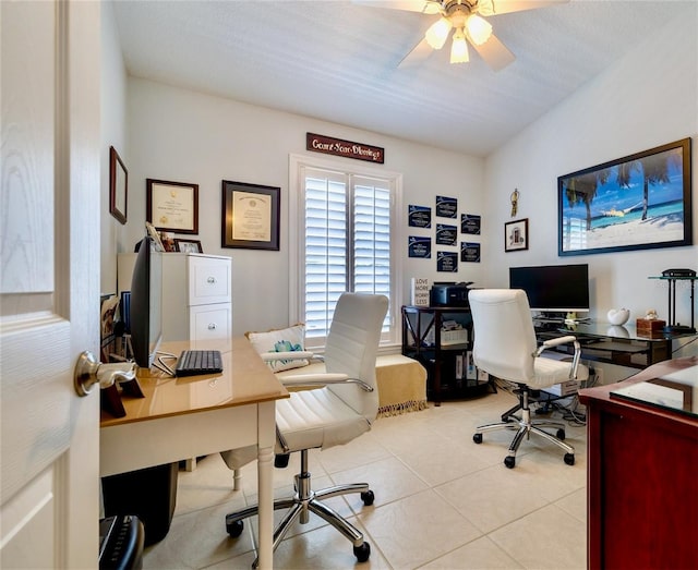 office with light tile patterned flooring and ceiling fan