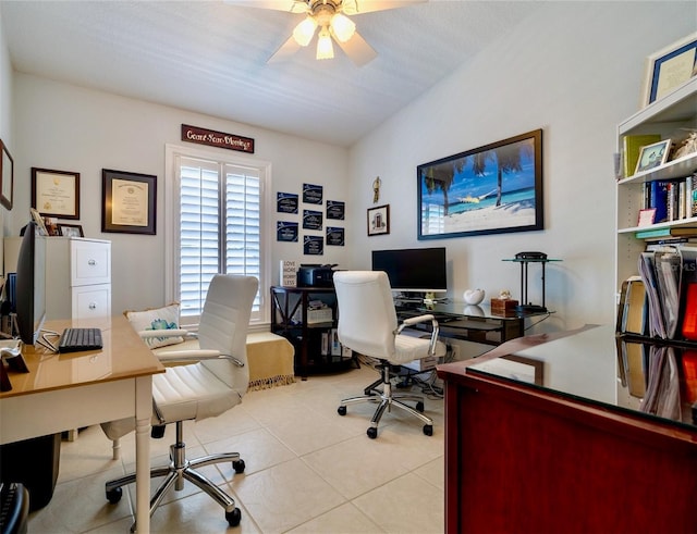 office featuring light tile patterned floors and ceiling fan