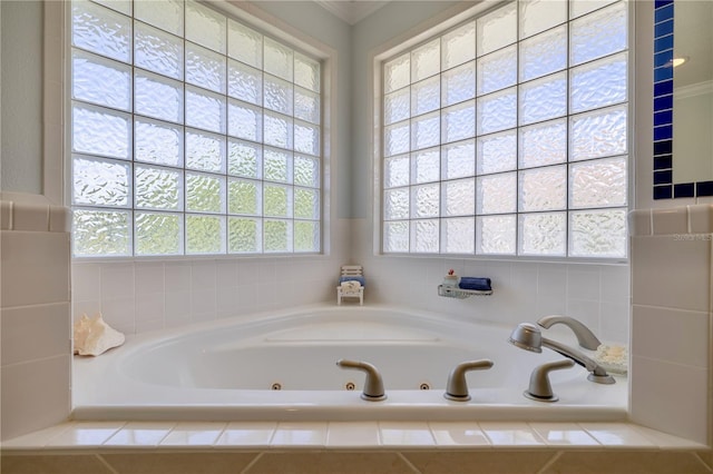 bathroom featuring a relaxing tiled tub