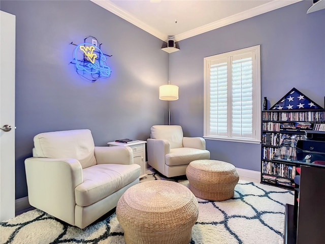 living area with crown molding