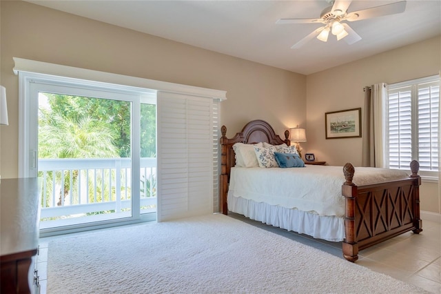 tiled bedroom with ceiling fan