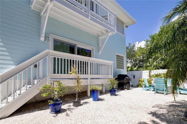 exterior space with a balcony and a patio area