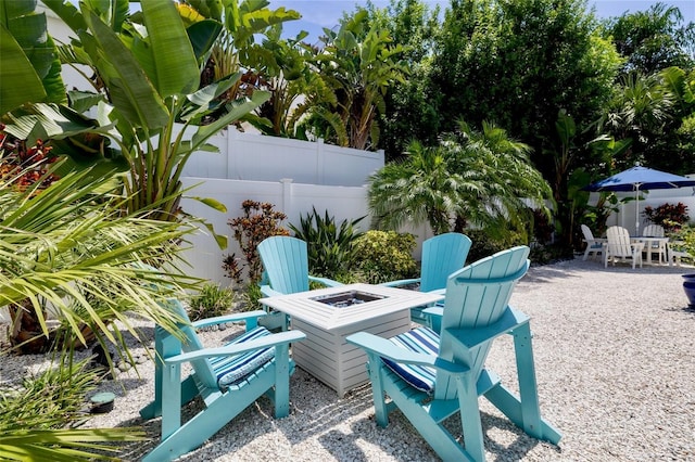 view of patio featuring a fire pit