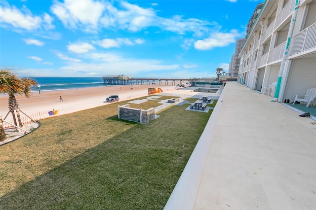 property view of water featuring a beach view