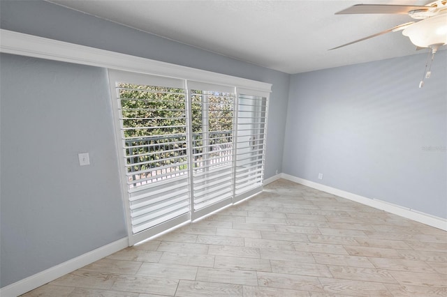 unfurnished room featuring ceiling fan