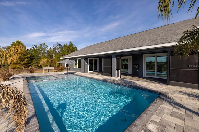 view of swimming pool featuring a patio