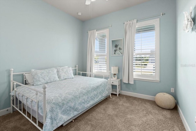 bedroom featuring ceiling fan and carpet flooring