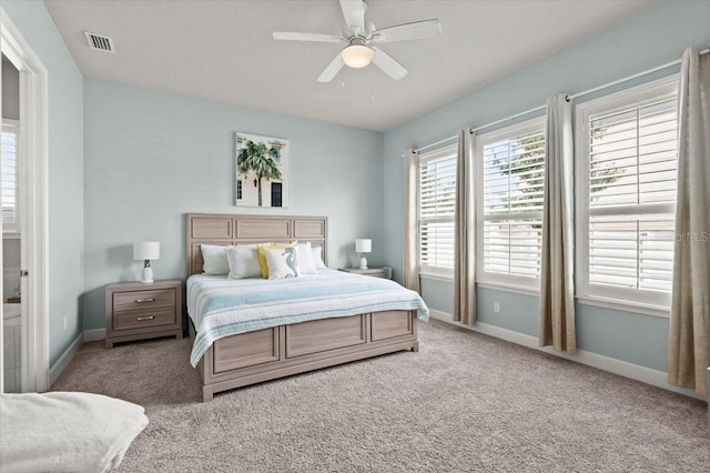 bedroom with light colored carpet and ceiling fan