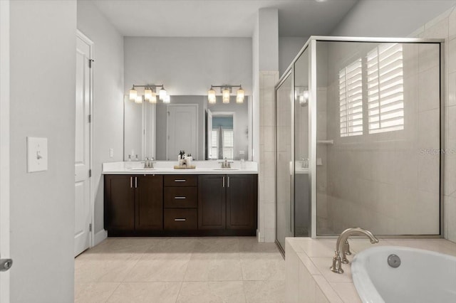 bathroom with vanity, tile patterned floors, and plus walk in shower