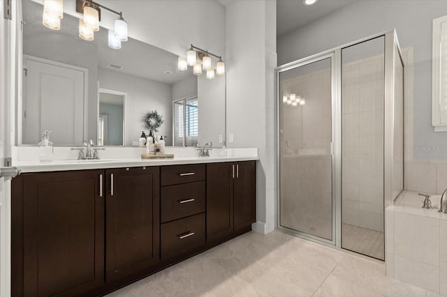 bathroom with vanity, separate shower and tub, and tile patterned floors