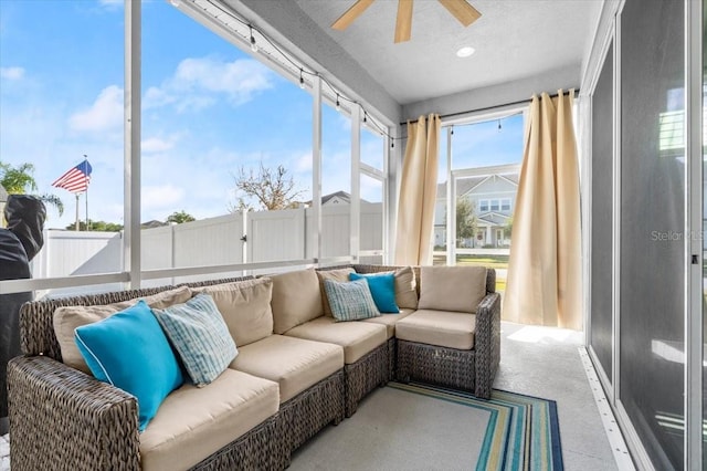 sunroom with ceiling fan