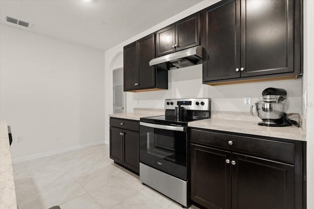 kitchen with dark brown cabinetry and stainless steel electric stove