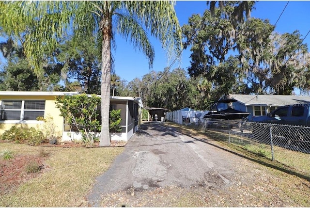 exterior space with a front lawn