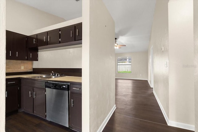 kitchen with dark hardwood / wood-style floors, dishwasher, sink, and dark brown cabinetry