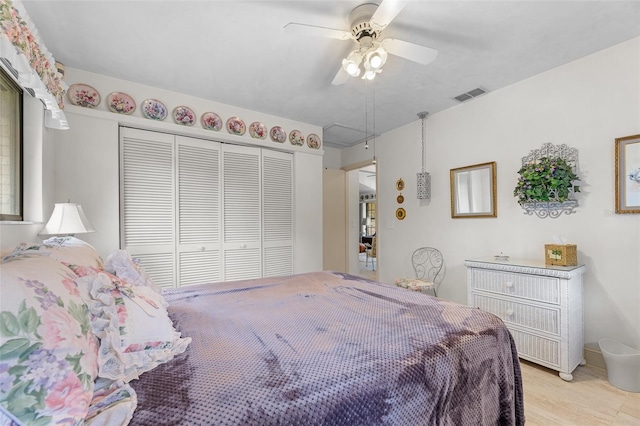 bedroom with a closet and ceiling fan