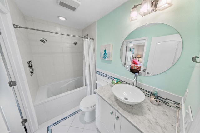 full bathroom with tile patterned flooring, vanity, shower / tub combo, and toilet