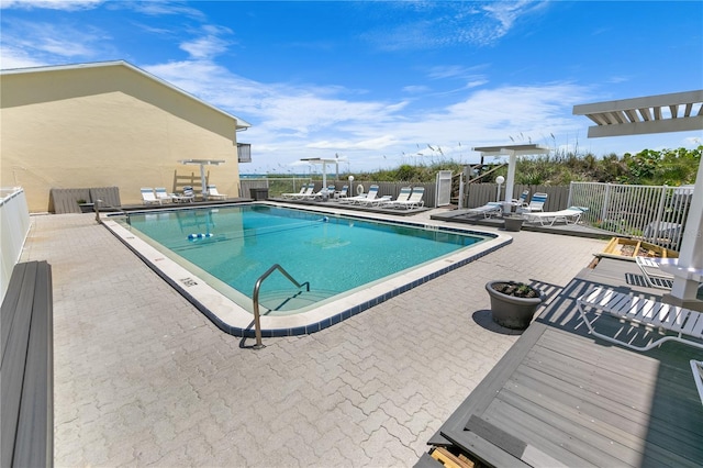 view of pool featuring a patio