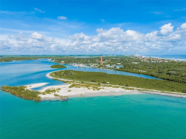 bird's eye view with a beach view and a water view