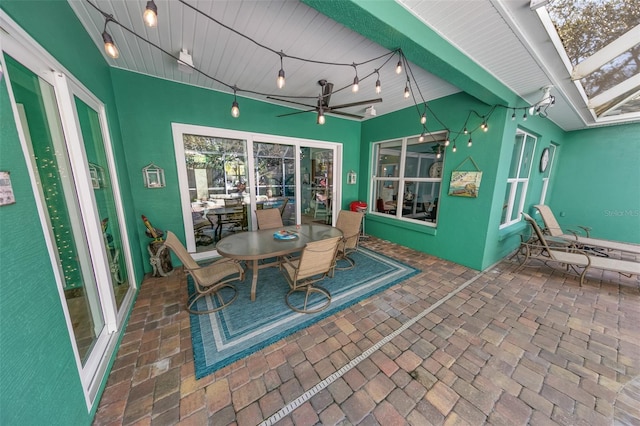 view of patio / terrace featuring ceiling fan