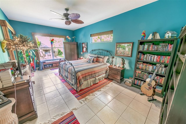 bedroom featuring light tile patterned floors and ceiling fan