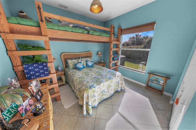 bedroom with tile patterned floors