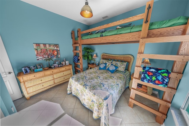 bedroom featuring tile patterned flooring