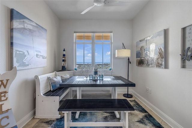 dining room featuring ceiling fan