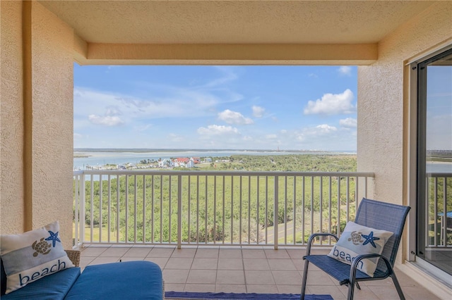 balcony featuring a water view