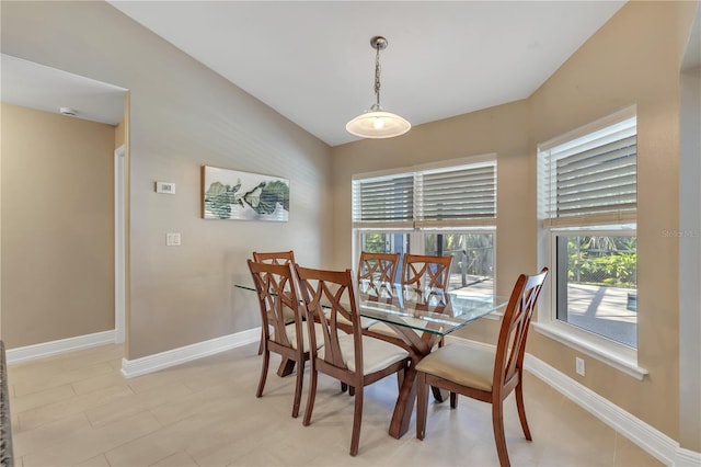 dining area with lofted ceiling