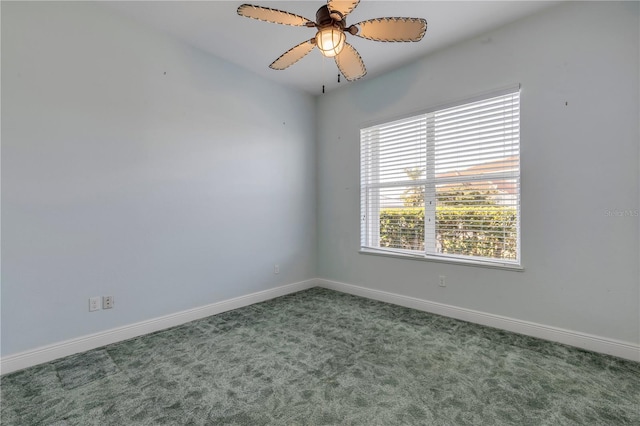 unfurnished room with carpet and ceiling fan