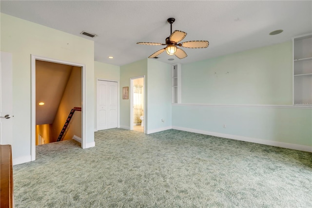 interior space featuring ceiling fan, a closet, and carpet