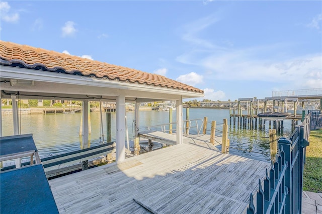 dock area featuring a water view