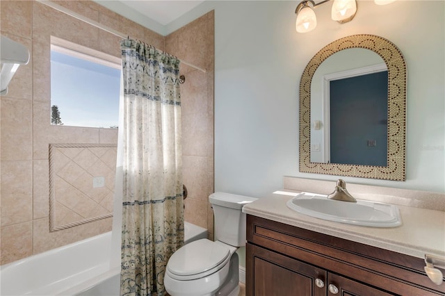 full bathroom featuring vanity, shower / bathtub combination with curtain, and toilet