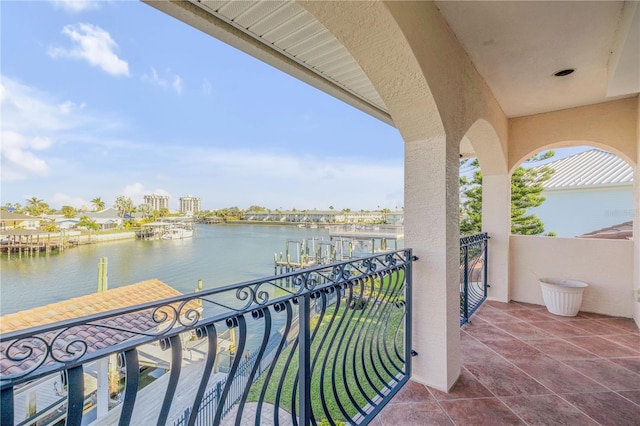 balcony featuring a water view