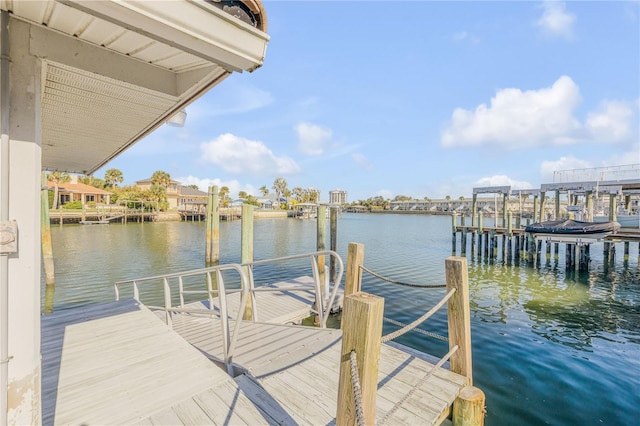 view of dock with a water view