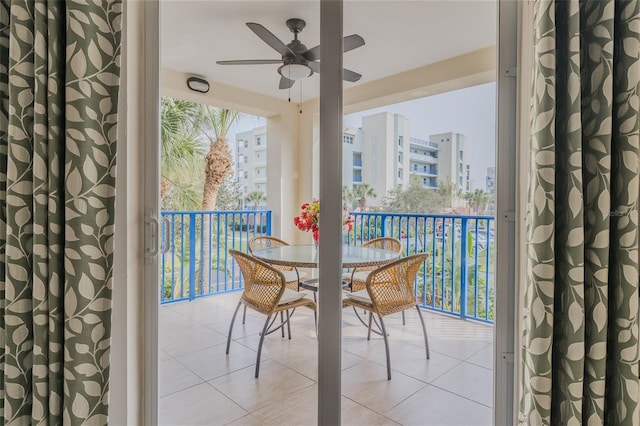 balcony featuring ceiling fan