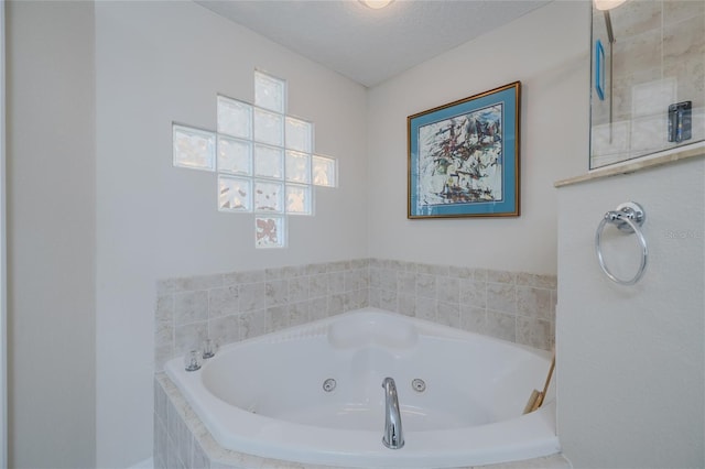 bathroom featuring a relaxing tiled tub