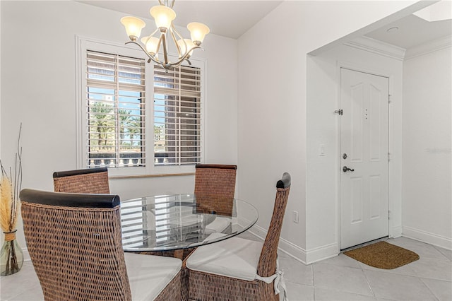 tiled dining space with ornamental molding and a notable chandelier