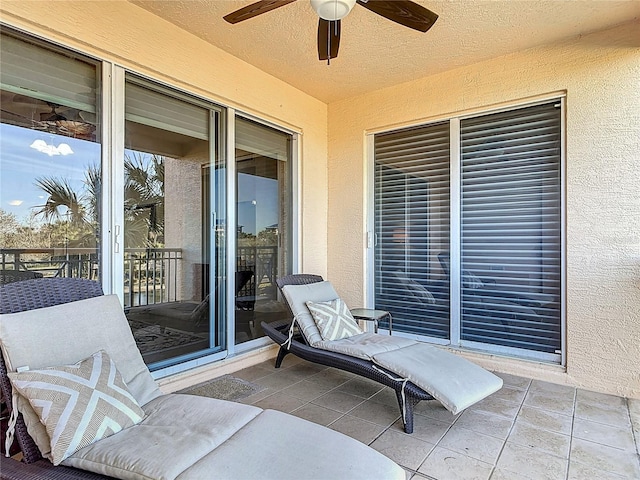 view of patio / terrace featuring a ceiling fan