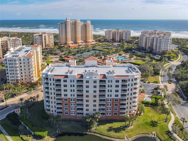 aerial view featuring a water view and a view of city