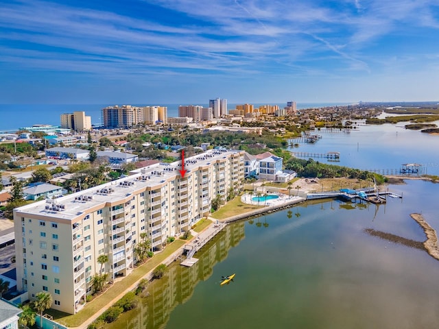 birds eye view of property featuring a water view