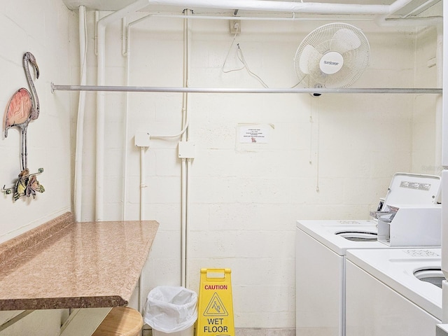 washroom featuring washing machine and dryer