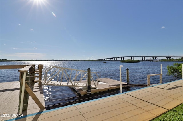 dock area with a water view