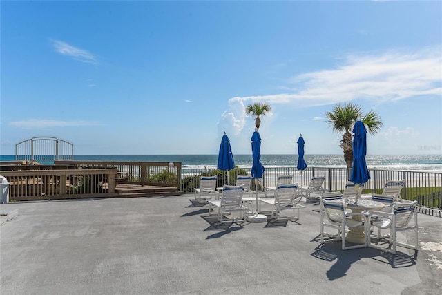 view of patio featuring a water view